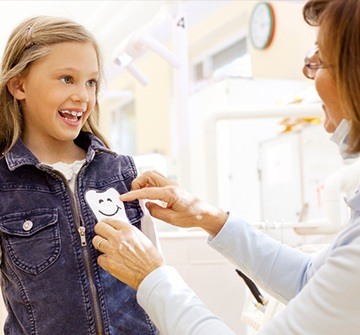 Child smiling at dentist