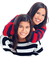 Two young women with beautiful smiles