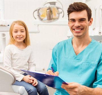 a child visiting their emergency dentist