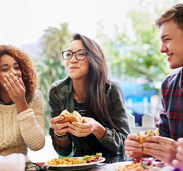 Friends enjoying meal together