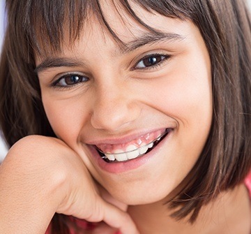 Closeup of young girl with oral appliance