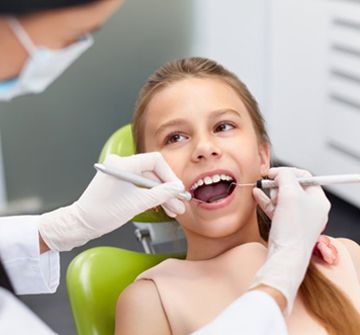 A child undergoing a dental exam.