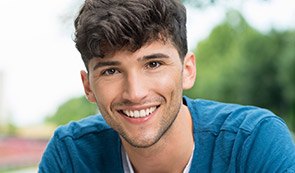 Smiling teen boy outdoors