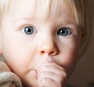 Child sucking his thumb