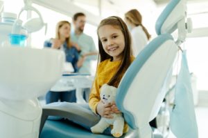 a child visiting her dentist for a checkup