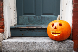 a carved pumpkin made to look like it has braces